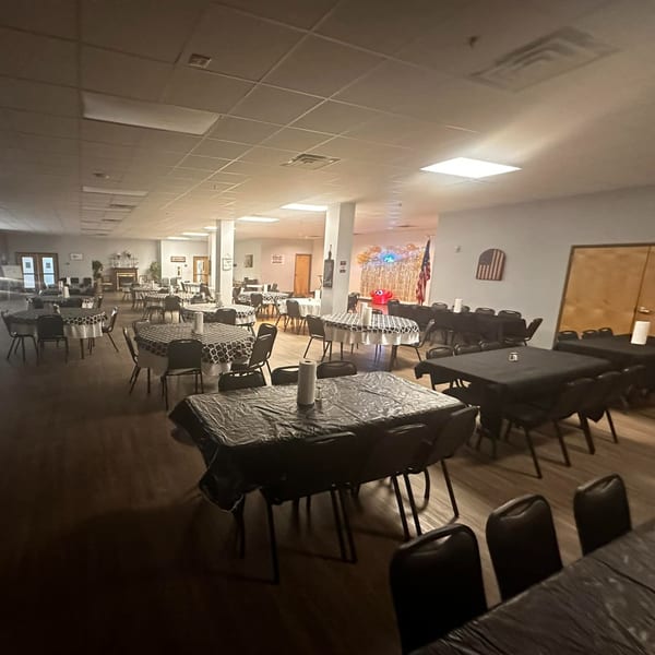 Spacious dining room at Southern Soul Cafe with many tables set for guests.